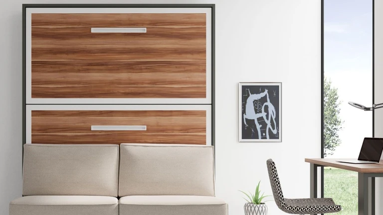Un lit superposé escamotable avec canapé intégré au design très élégant.
