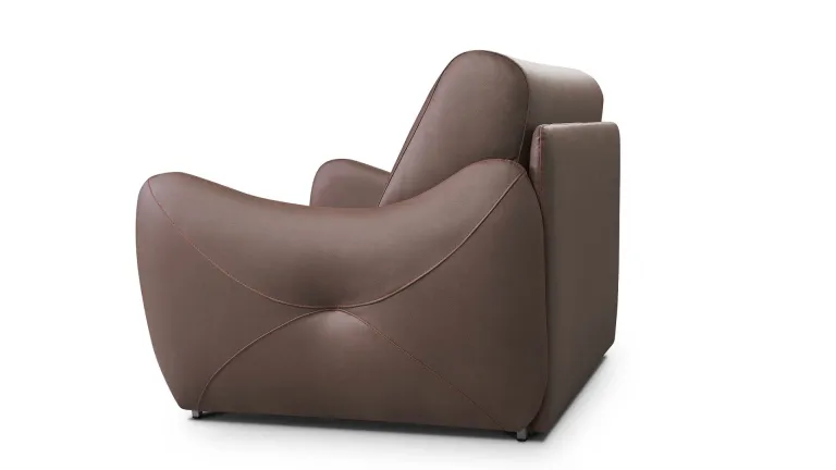 Fauteuil convertible rembourré avec plus de 40 couleurs disponibles.